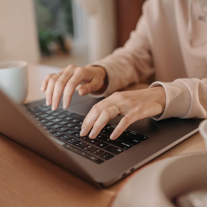 laptop typing- apprentoceship cv writting